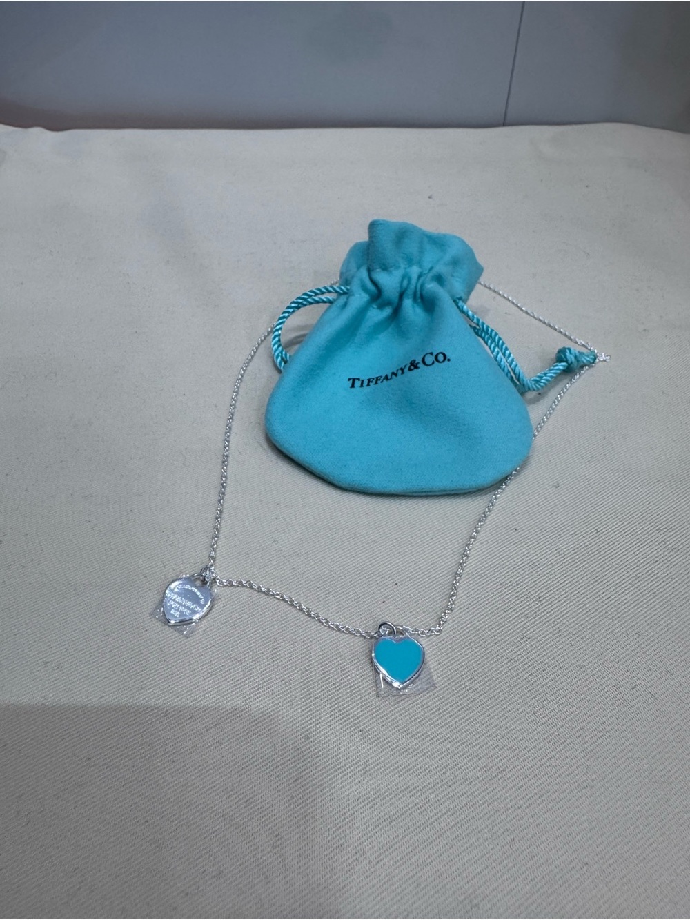 Tiffany & Co. Silver Necklace with Blue Heart Charm